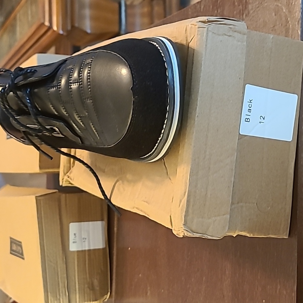 Black pair of 12 Gatsby shoes